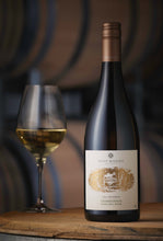 Load image into Gallery viewer, Bottle and glass of Deep Woods Reserve Chardonnay wine in a barrel room
