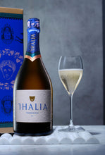 Load image into Gallery viewer, Bottle and glass of Thalia sparkling wine next to blue gift box